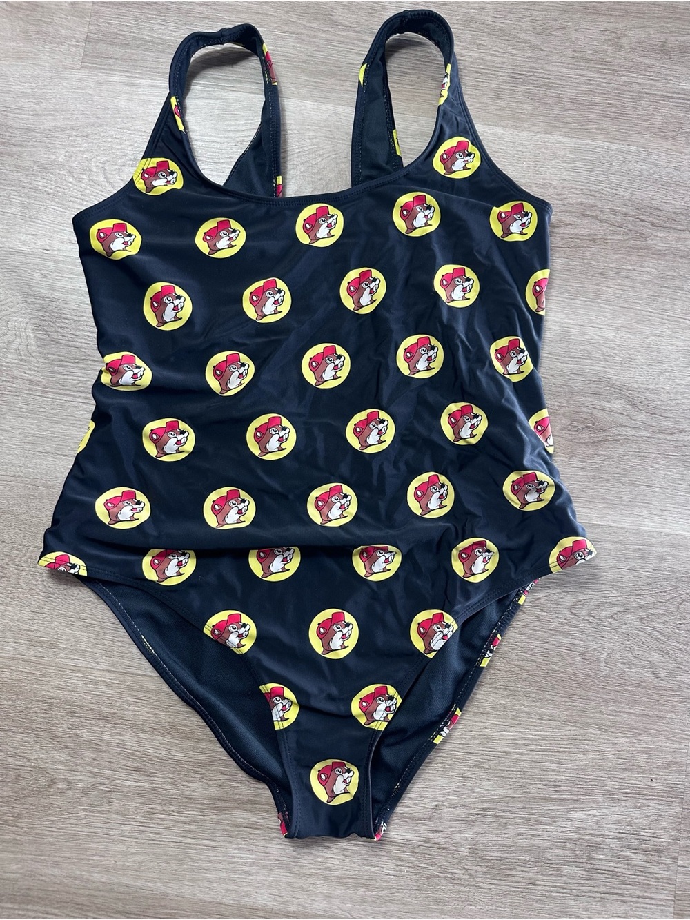 Black One-Piece Swimsuit with Red & Yellow Character Print